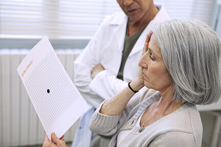 Woman taking Amsler Grid test